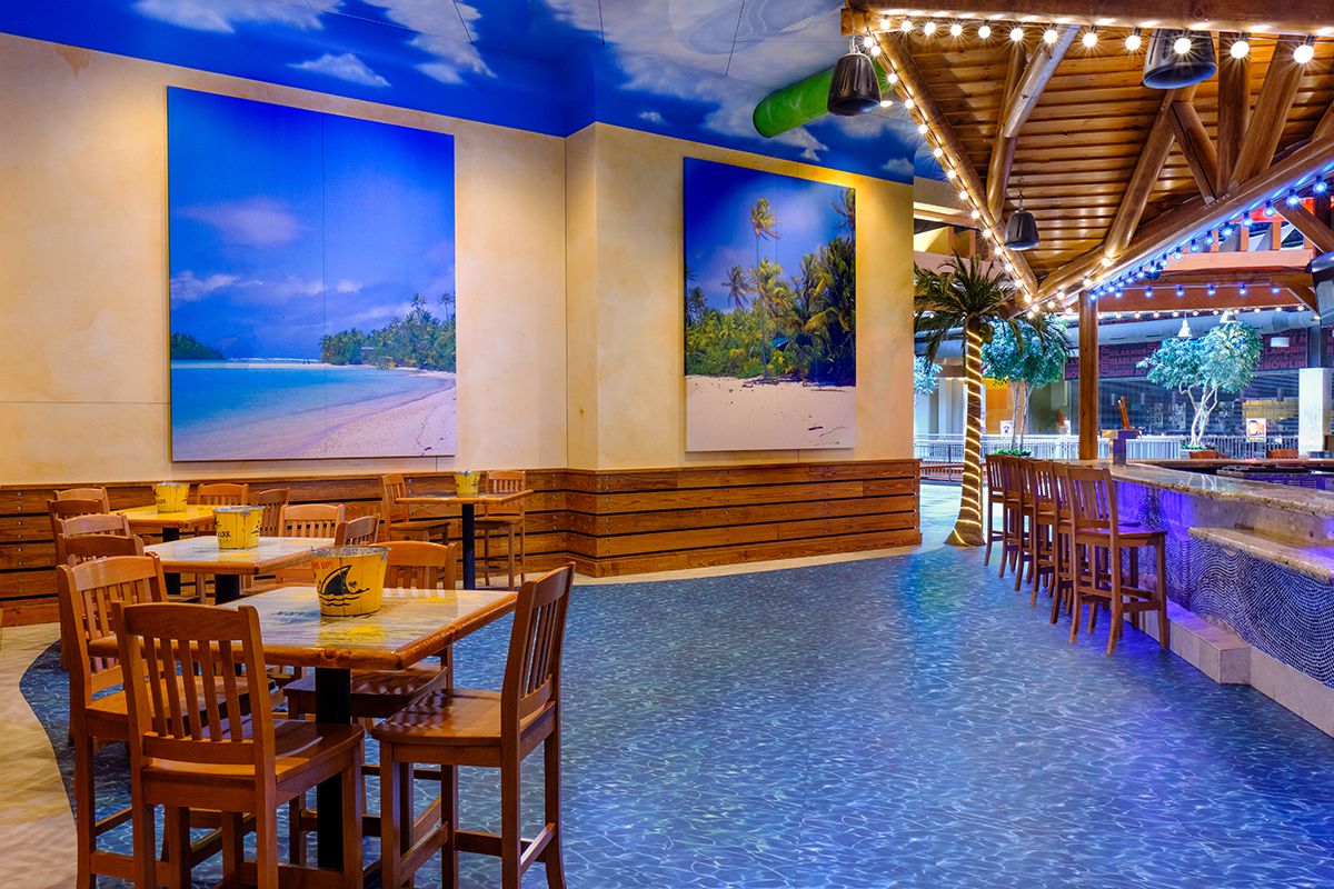 Alcove Interior in blue with chairs and tables